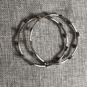 Wavy or curved bangle bracelets